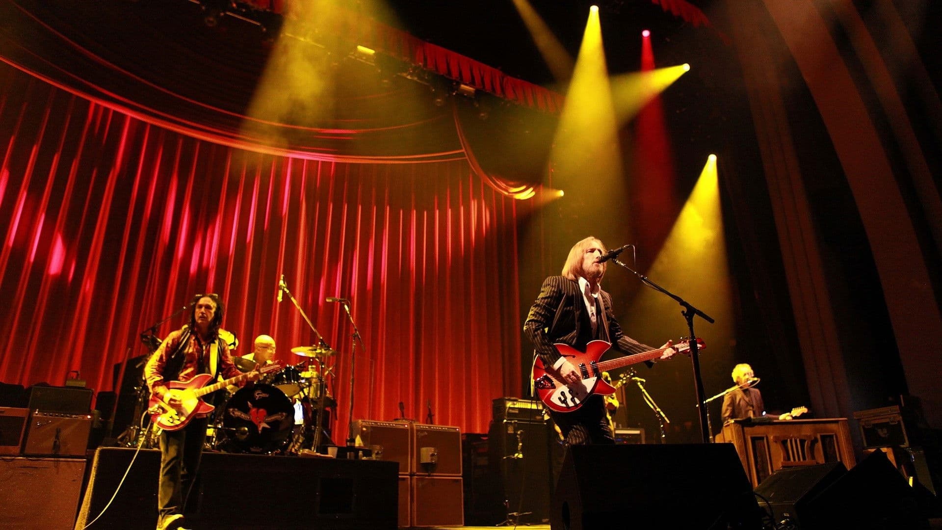 Poster backdrop for Tom Petty And The Heartbreakers: Live in Concert