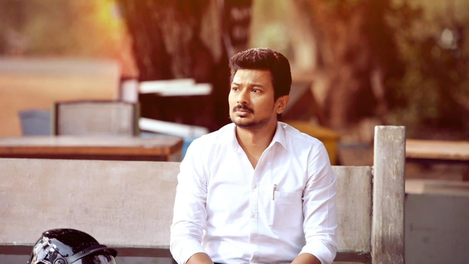 Poster backdrop for Manithan