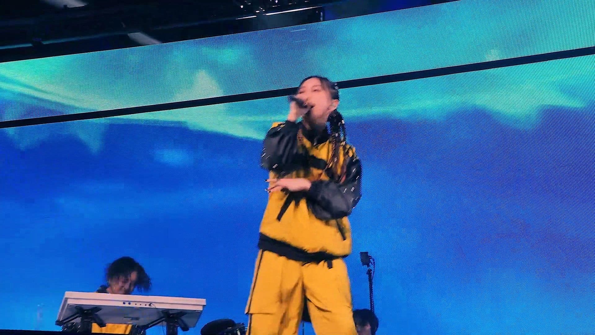 Poster backdrop for Yoasobi Arena Tour "Denkōsekka" Day1