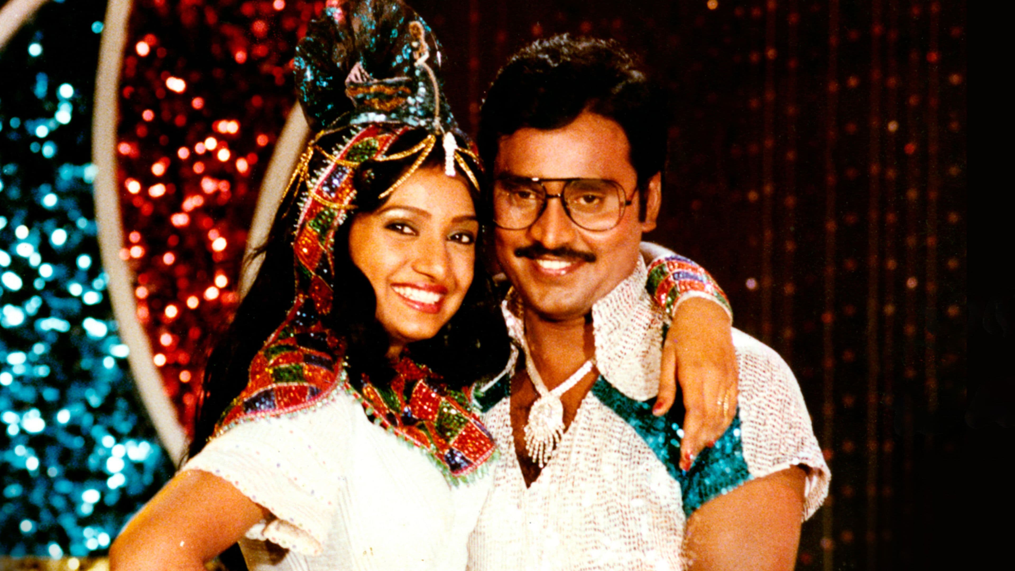 Poster backdrop for Dhavani Kanavugal