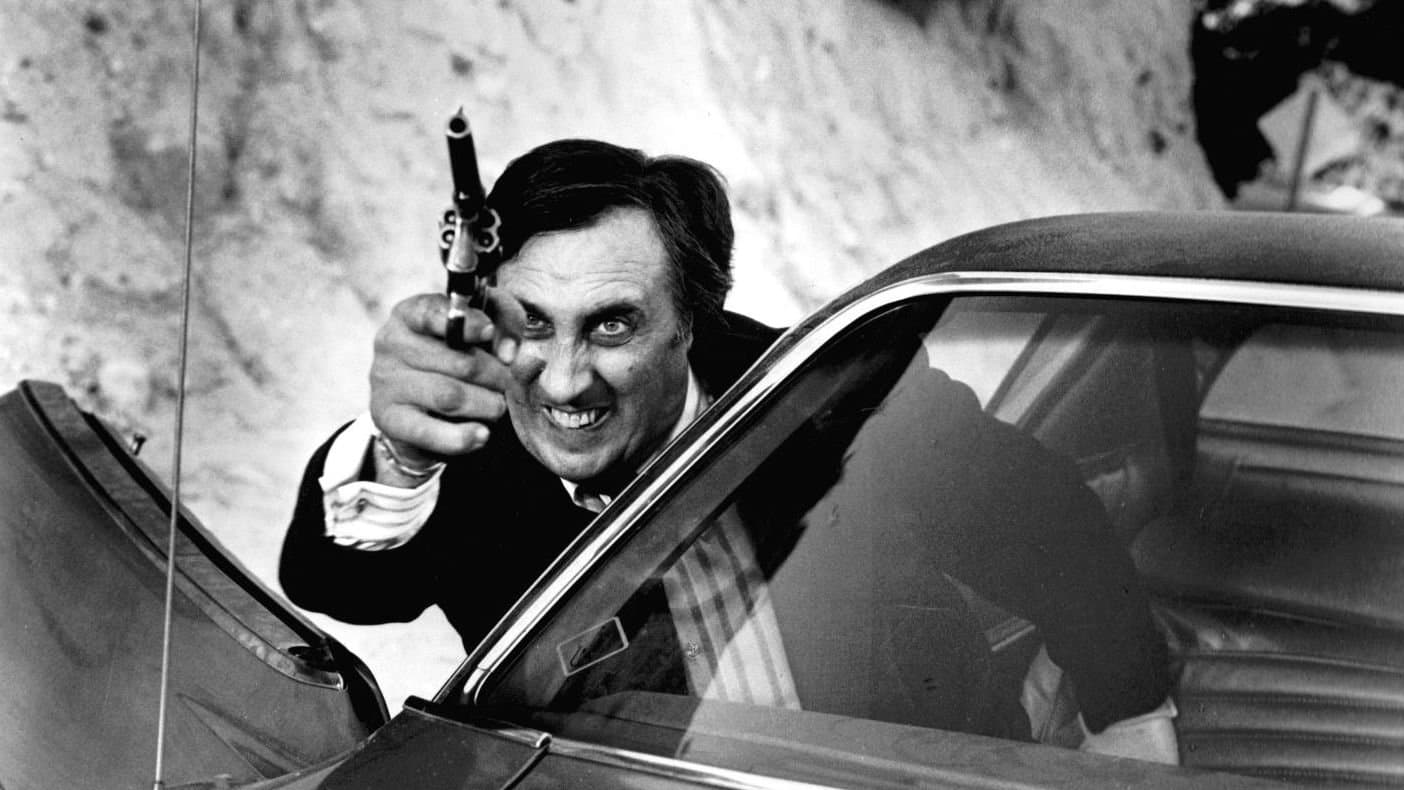 Poster backdrop for The Outfit