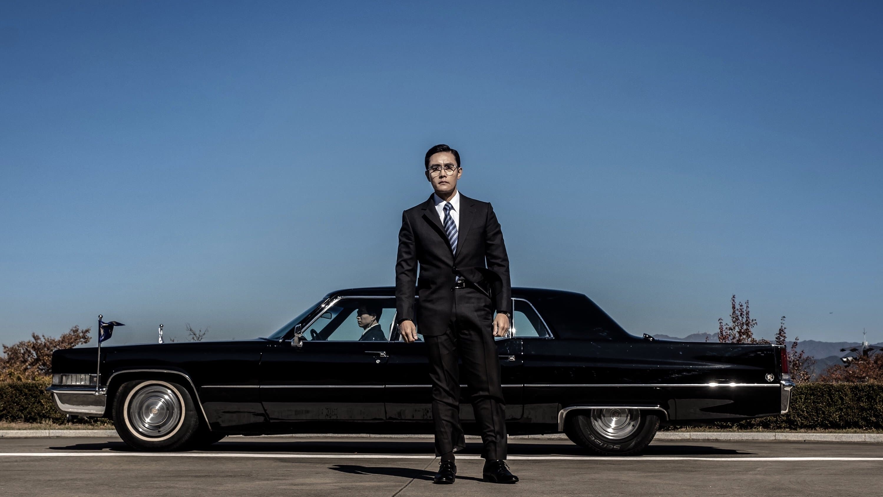 Poster backdrop for The Man Standing Next