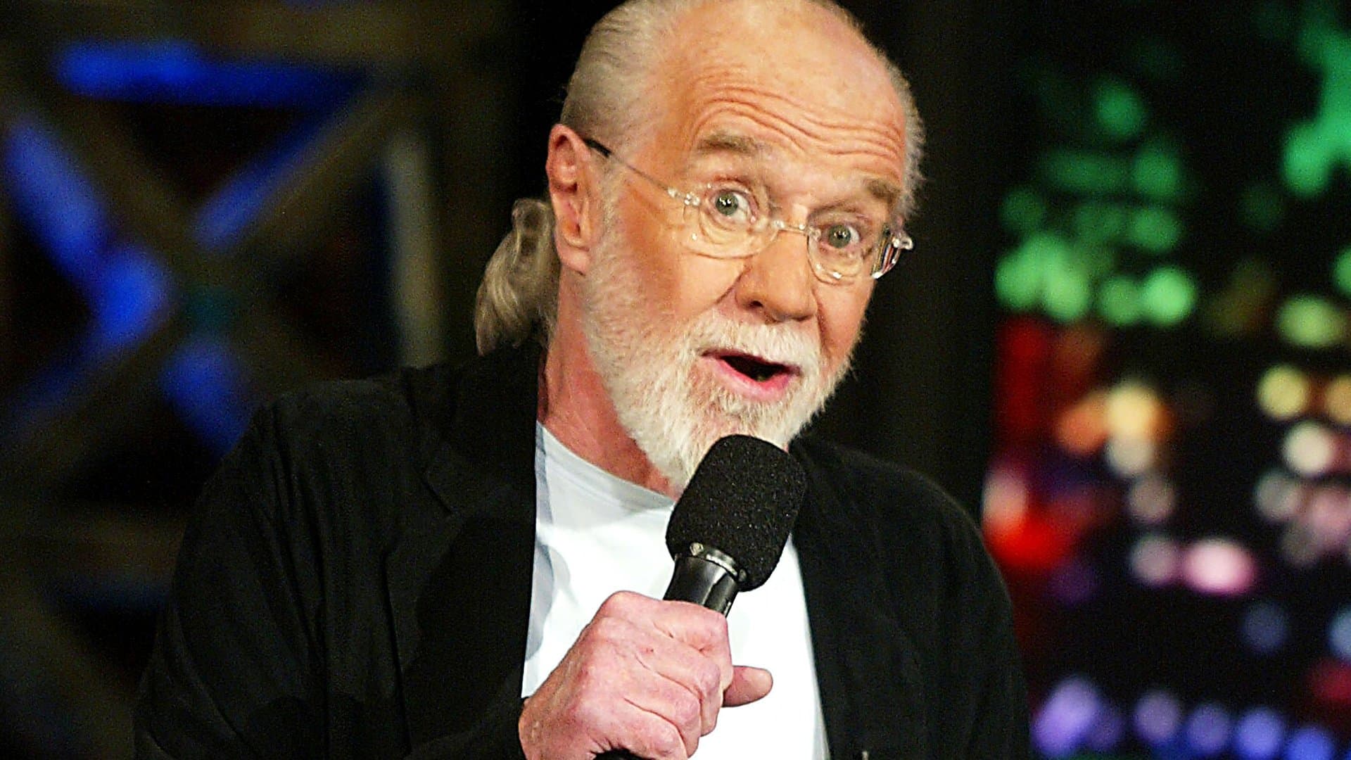 Poster backdrop for George Carlin: Doin' It Again