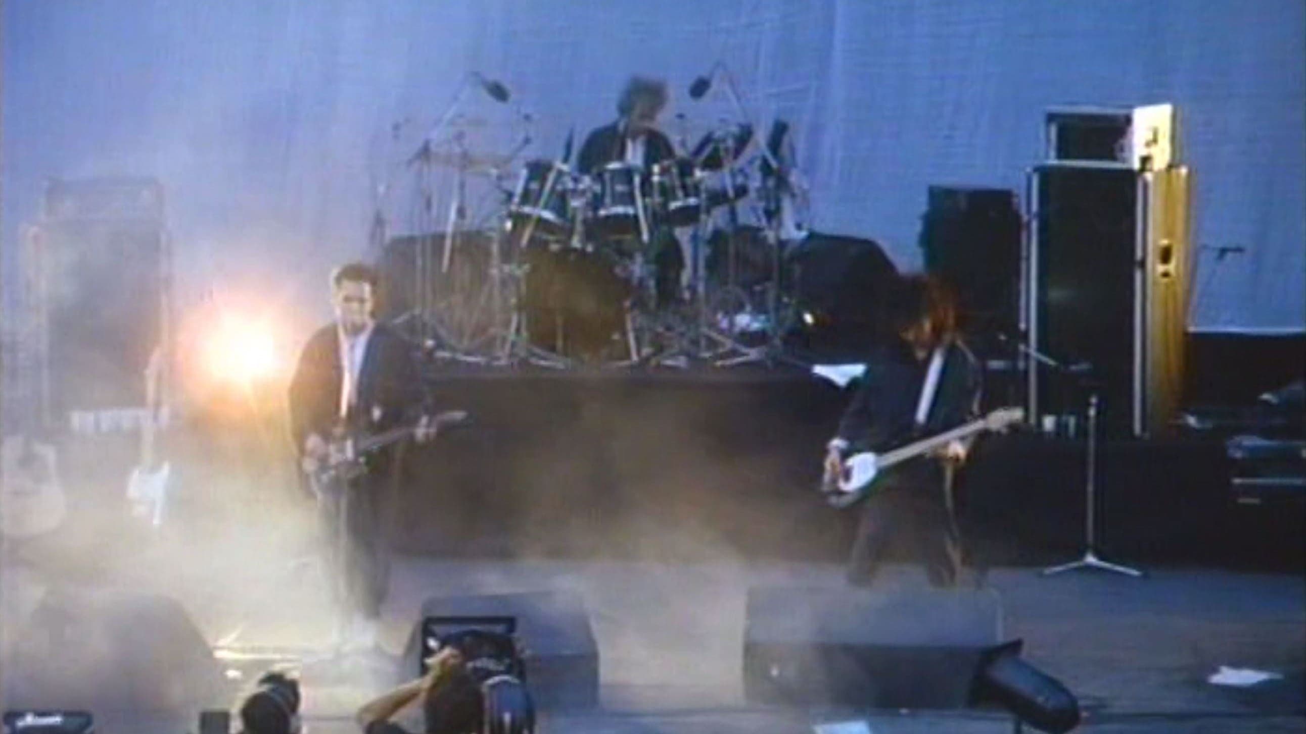 Poster backdrop for The Cure In Orange