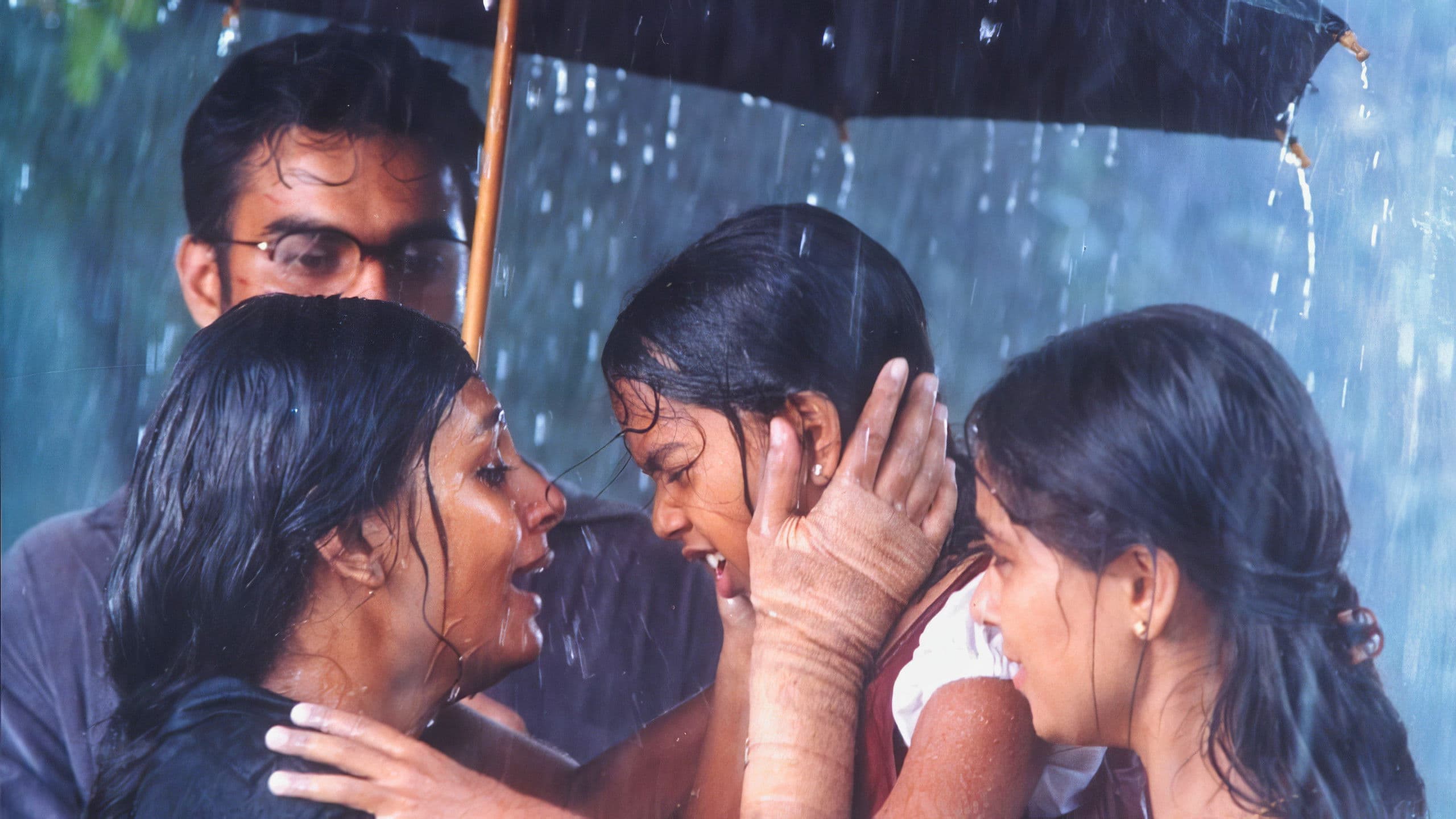 Poster backdrop for Kannathil Muthamittal