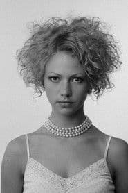 Actor Inga Alsiņa-Lasmane as Elvīra Baumane